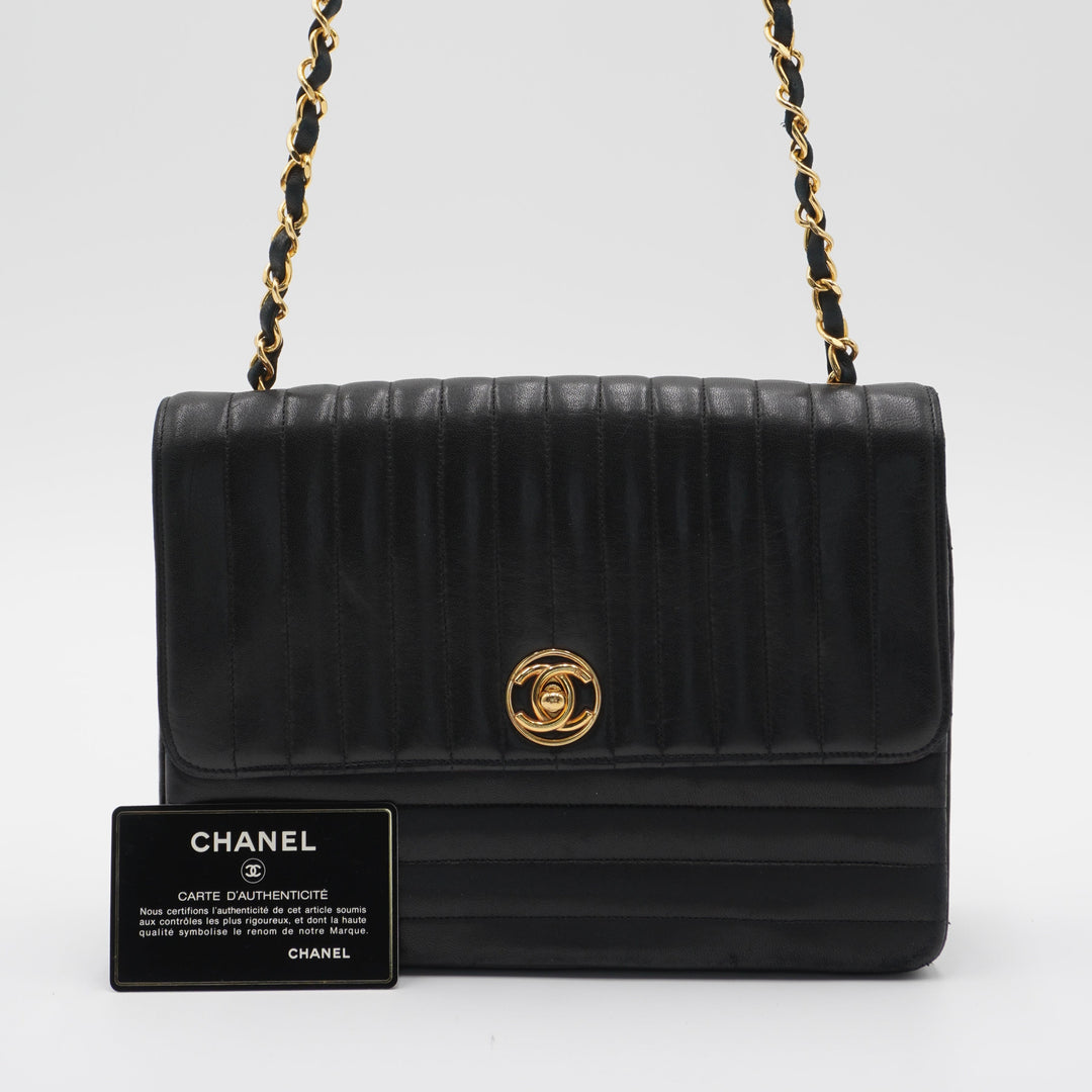 CHANEL Vintage Mademoiselle Vertical Quilted Shoulder Bag